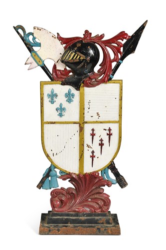 Lot 417 - A late Victorian painted cast-iron doorstop, in the form of a coat of arms