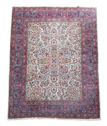 Lot 614 - A Kirman carpet, circa 1940