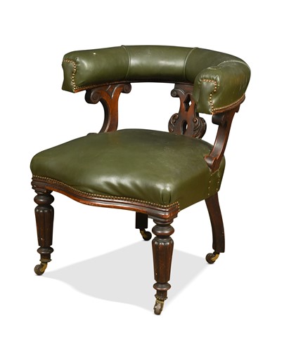 Lot 655 - A Victorian mahogany and green leather tub chair