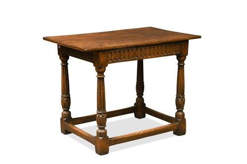 Lot 374 - An Elizabethan style carved oak centre table, 19th century