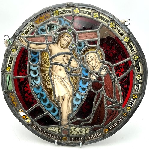 Lot 223 - A 19th century stained glass circular panel...