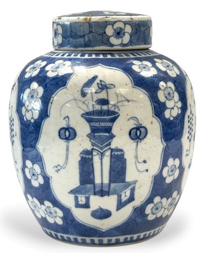 Lot 36 - A Chinese blue and white export porcelain prunus and cracked ice pattern ginger jar and cover