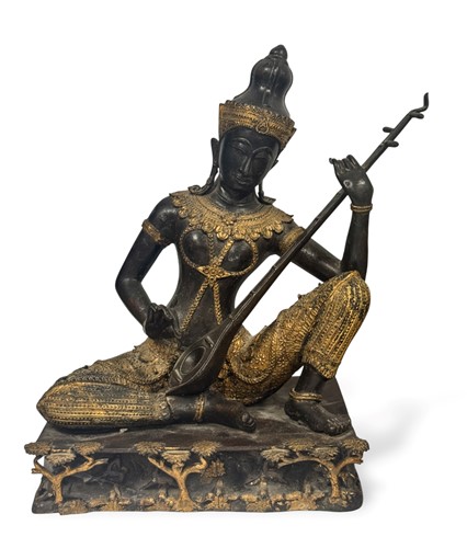 Lot 95 - A Thai parcel gilt bronze figure of the Goddess Saraswati, early 20th century