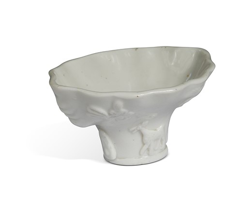 Lot 22 - A Chinese Dehua kilns blanc de chine libation cup, Shunzhi or Kangxi Emperor (circa 1640-1700)