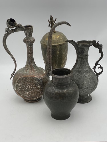 Lot 108 - A Persian tinned copper ewer together with a...