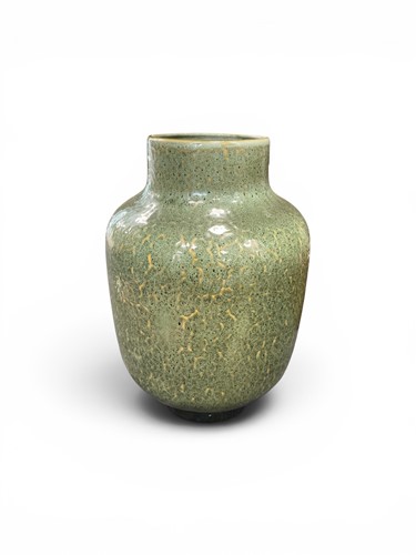 Lot 36 - A large green vase with mottled glaze, 56cm high