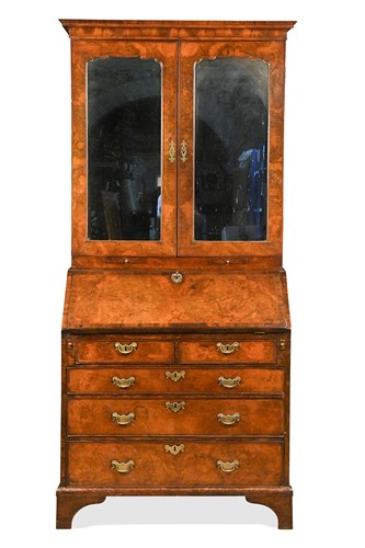 Lot 447 - A George I walnut bureau bookcase