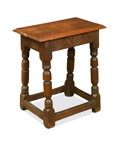 Lot 361 - A 17th century and later carved oak stool,...