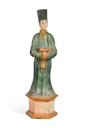 Lot 7 - A Chinese sancai pottery tomb figure of a standing priest, probably Ming Dynasty