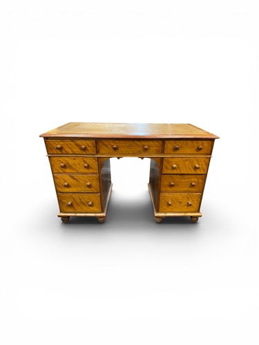 Lot 376 - A Victorian satin birch kneehole desk, with a...