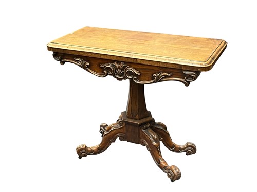Lot 695 - A Victorian rosewood card table