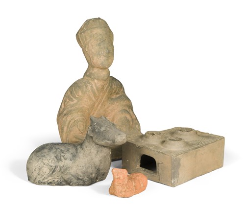 Lot 5 - A Chinese grey pottery tomb figure of a seated dignitary, probably early Tang Dynasty