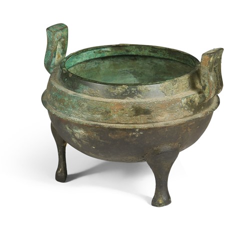 Lot 48 - A Chinese archaic bronze tripod Ding, Warring States type