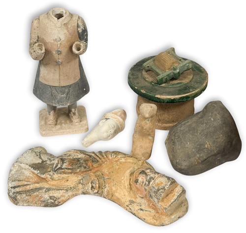Lot 2 - A Chinese pottery tomb attendant, probably Tang Dynasty