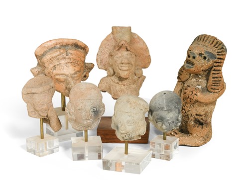 Lot 494 - A group of seven Pre-Columbian and other pottery deity heads