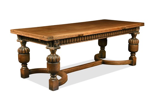 Lot 367 - An Elizabethan style oak draw leaf dining table, 19th century