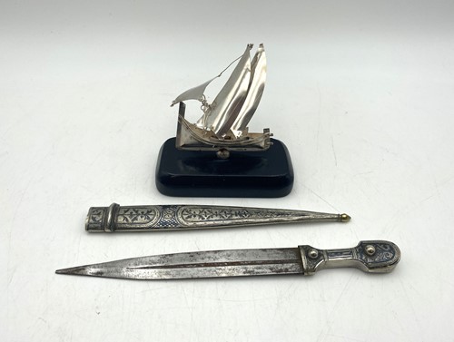 Lot 156 - A silver model of a ship and an Indian dagger