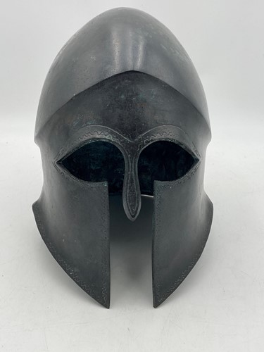 Lot 86 - A bronze replica Greek Corinthian style helmet,...