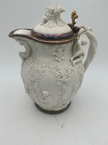 Lot 5 - A 19th century mounted harvest jug, 26cm