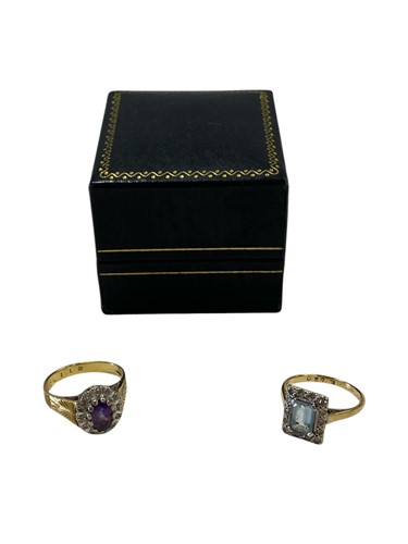 Lot 180 - A hallmarked 18ct gold amethyst cluster ring,...