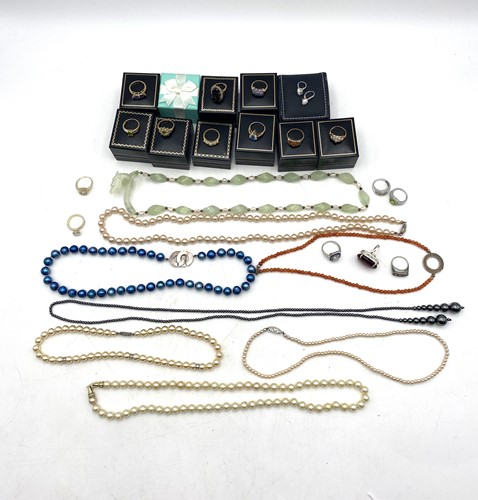 Lot 179 - A collection of costume jewellery, together...