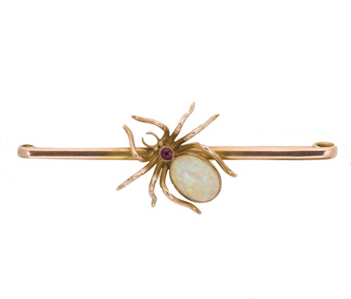 Lot 25 - An early 20th century opal spider brooch