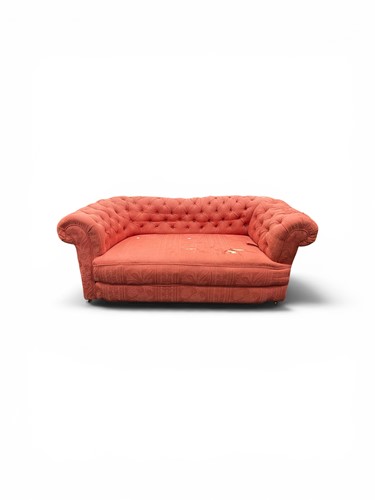 Lot 614 - A small two seat Chesterfield sofa, with deep...