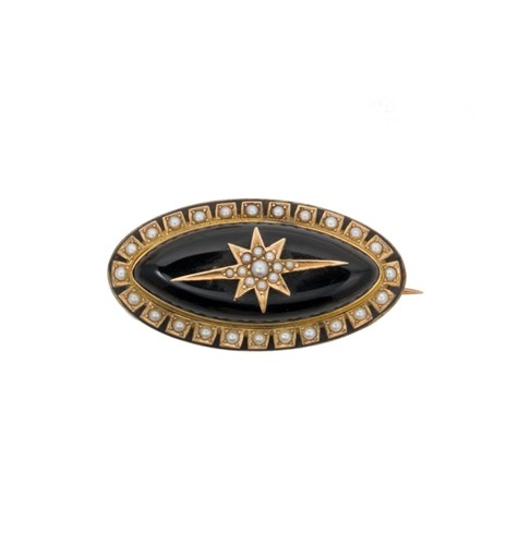 Lot 26 - A Victorian onyx and split pearl mourning brooch