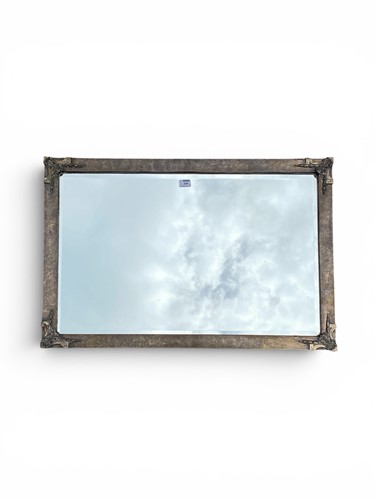 Lot 395 - A 1930s Continental scaled metal overmantel...