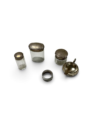 Lot 283 - A silver cream jug and napkin ring, together...
