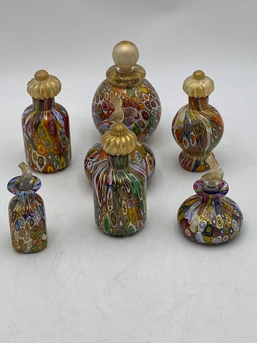 Lot 40 - A group of Murano scent bottles, some in apple...