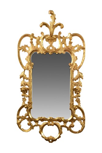 Lot 431 - A George III carved giltwood mirror