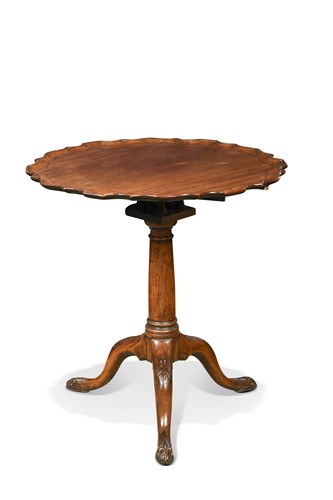 Lot 569 - A George III mahogany piecrust tripod table