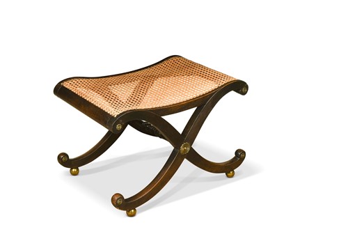 Lot 555 - A Regency stained beech stool