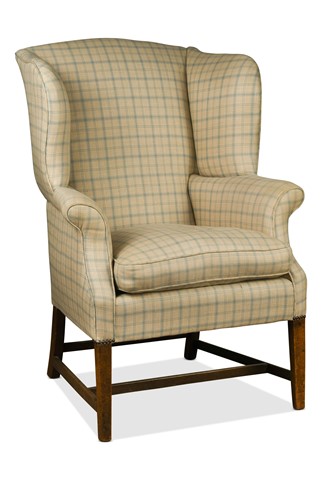 Lot 422 - A late George III mahogany wingback armchair