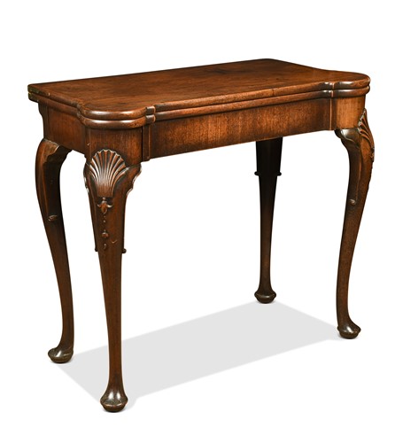 Lot 414 - A George III mahogany card table