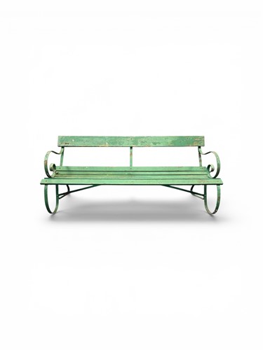 Lot 439 - A late Victorian green painted garden bench...