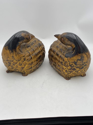 Lot 115 - A pair of decorative carved painted and gilded...