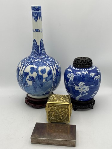 Lot 46 - A blue and white bottle vase on stand with...