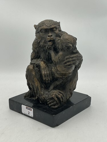 Lot 2 - A monkey mother and young figural group, cold...