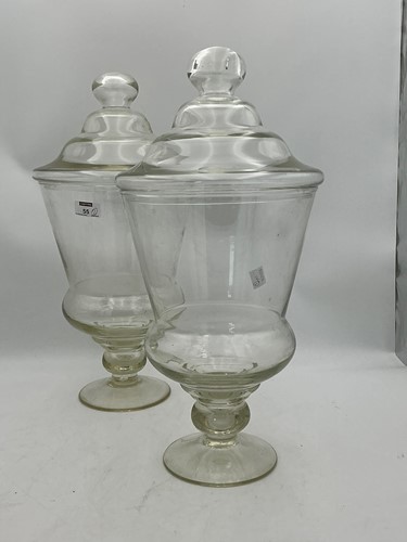 Lot 55 - A pair of large lidded apothecary glass jars,...