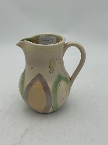 Lot 67 - A Susie Cooper jug, orchid pattern studio ware,...