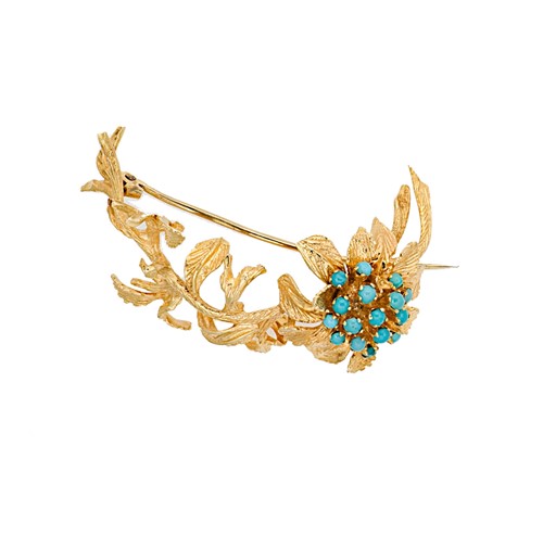 Lot 98 - A floral turquoise brooch