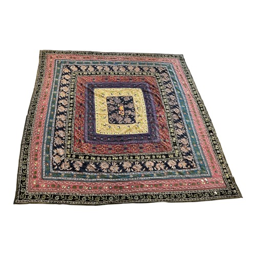 Lot 234 - An Indian embroidered bedspread, 20th century,...