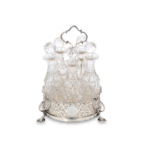 Lot 363 - Charles Thomas Fox & George Fox - A Victorian silver cruet frame with five cut glass bottles