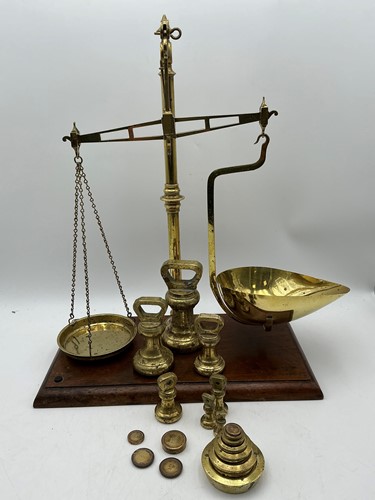 Lot 196 - A set of brass balance scales with various...