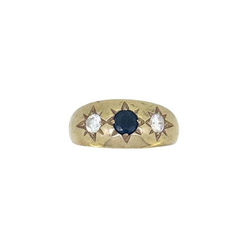 Lot 87 - A sapphire and cubic zirconia ring, width...