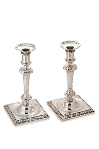 Lot 438 - Calderwood, Robert - A pair of George III Irish candlesticks