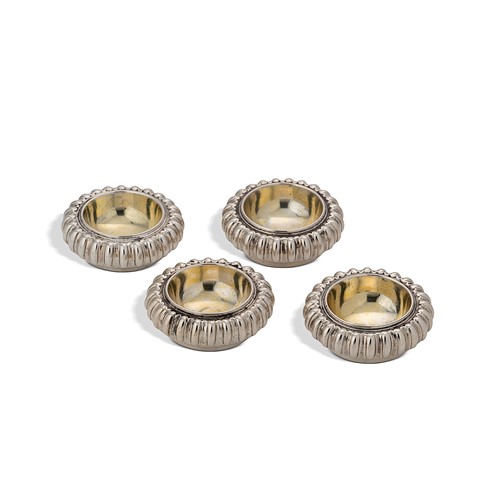 Lot 314 - Nelme, Anthony - A set of four George I Britannia standard silver salts