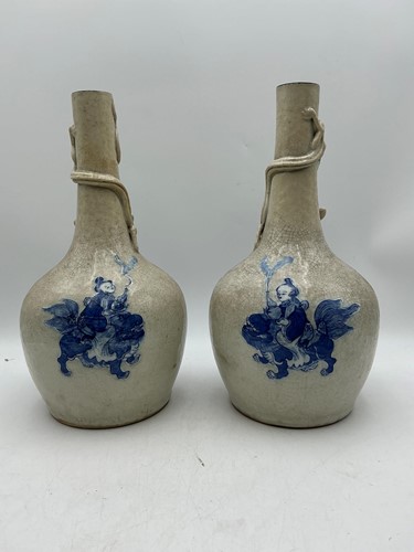 Lot 8 - A pair of Chinese crackle glazed bottle vases,...